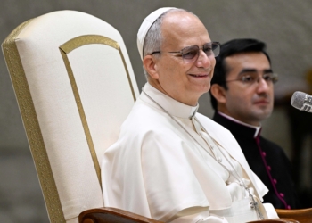 Pope Leo XIV smiles during his weekly general audience in the Paul VI Audience Hall at the Vatican Jan. 7, 2026. (CNS photo/Vatican Media)