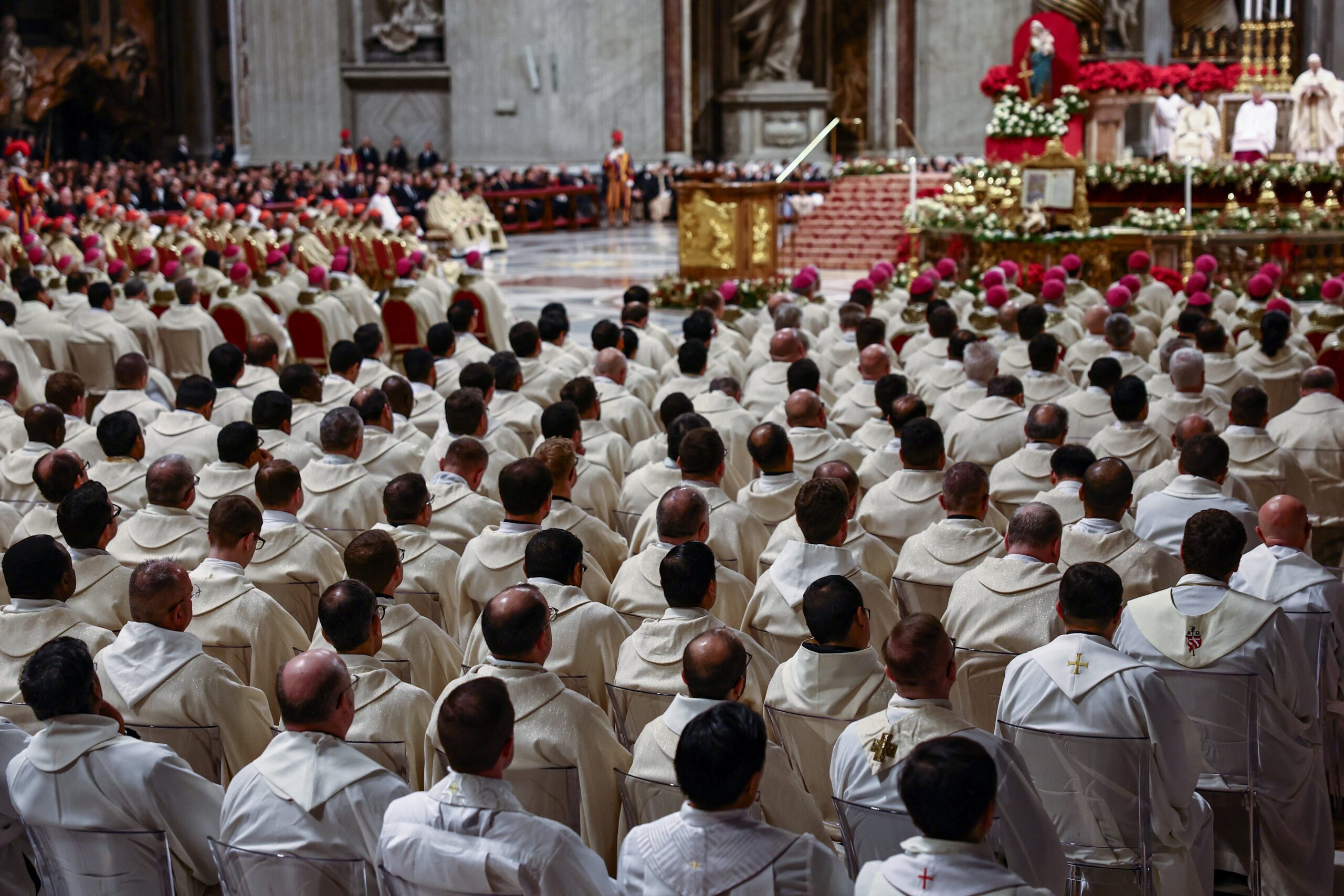 Members of the clergy listen as Pope Leo XIV celebrates Mass on the feast of the Epiphany in St. Peter's Basilica at the Vatican Jan. 6, 2026. (OSV News photo/Yara Nardi, Reuters)