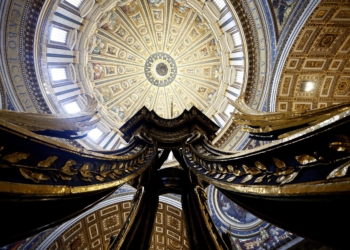 This is a file photo showin a detail of the baroque sculpted bronze canopy by Gian Lorenzo Bernini over the high altar of St. Peter's Basilica as it undergoes restoration at the Vatican. The Vatican presented some new initiatives for the 400th anniversary of the dedication of St. Peter's Basilica at a Feb. 16, 2026, news conference. (OSV News photo/Guglielmo Mangiapane, Reuters)