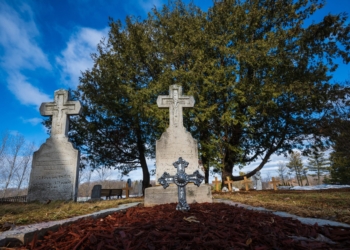 The grave of Adele Brice (Brise), center, pictured in a Jan. 9, 2026, photo, is a place that visitors to the National Shrine of Our Lady of Champion often stop and pray. The Diocese of Green Bay, Wis., formally opened the cause for the beatification and canonization of Adele Brice Jan. 30, 2026. (OSV News photo/Sam Lucero)