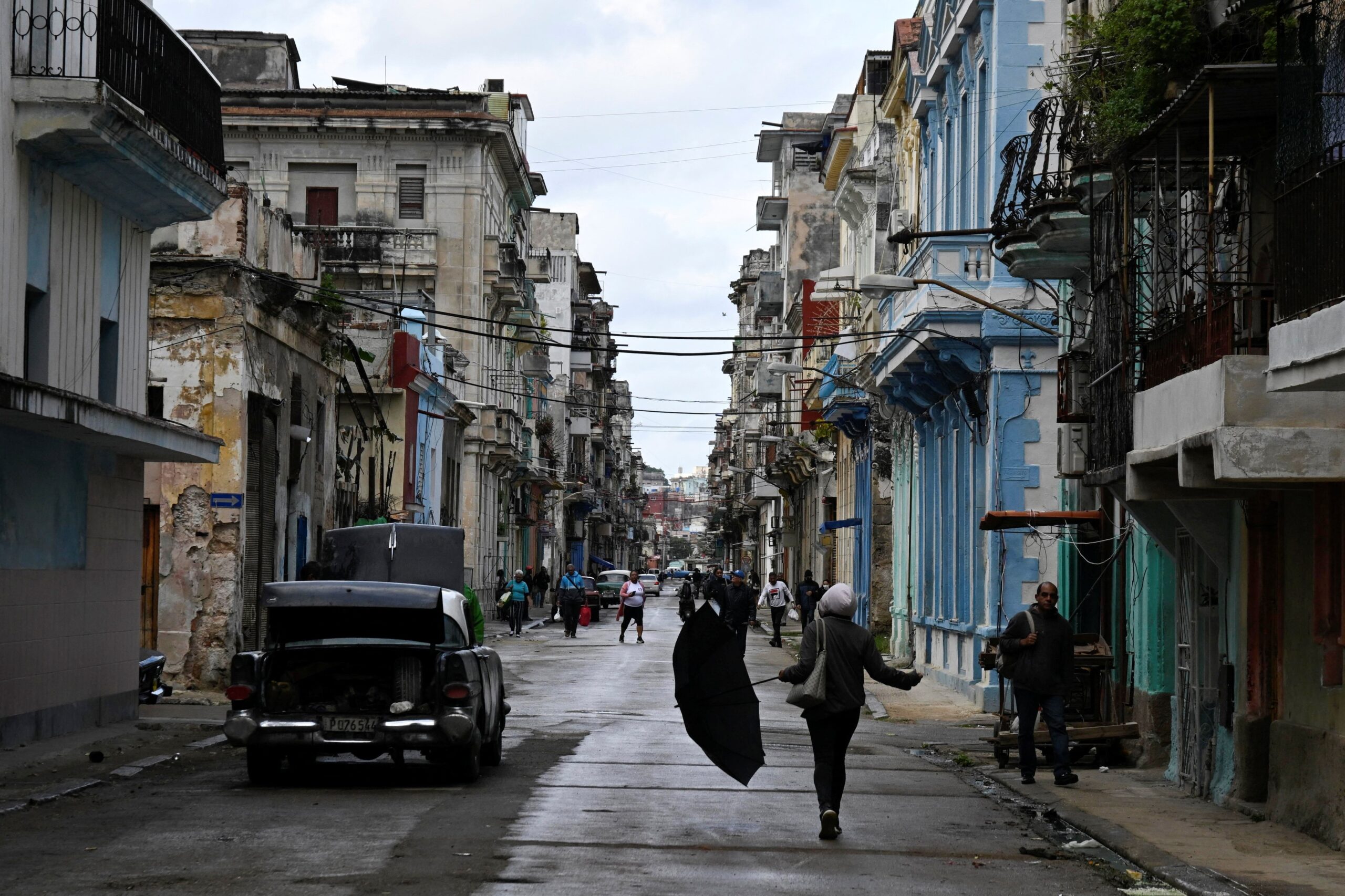 People walk on the street in Havana, as Cubans from all walks of life hunker into survival mode, navigating seemingly interminable blackouts and soaring prices for food, fuel, and transport, while the United States threatens a stranglehold on the communist-run nation, Cuba, January 30, 2026. (OSV News photo/Norlys Perez, Reuters)