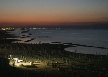 A beach is pictured at sunset in Rimini, Italy, in this July 7, 2017, file photo. The Vatican announced on Feb. 19, 2026, that Pope Leo XIV will be making day trips to six destinations in Italy, including Rimini .(CNS photo/Paul Haring)