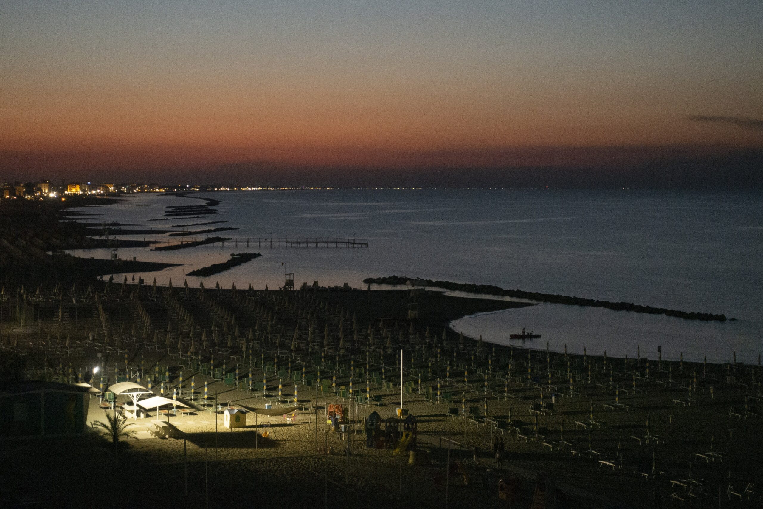 A beach is pictured at sunset in Rimini, Italy, in this July 7, 2017, file photo. The Vatican announced on Feb. 19, 2026, that Pope Leo XIV will be making day trips to six destinations in Italy, including Rimini .(CNS photo/Paul Haring)