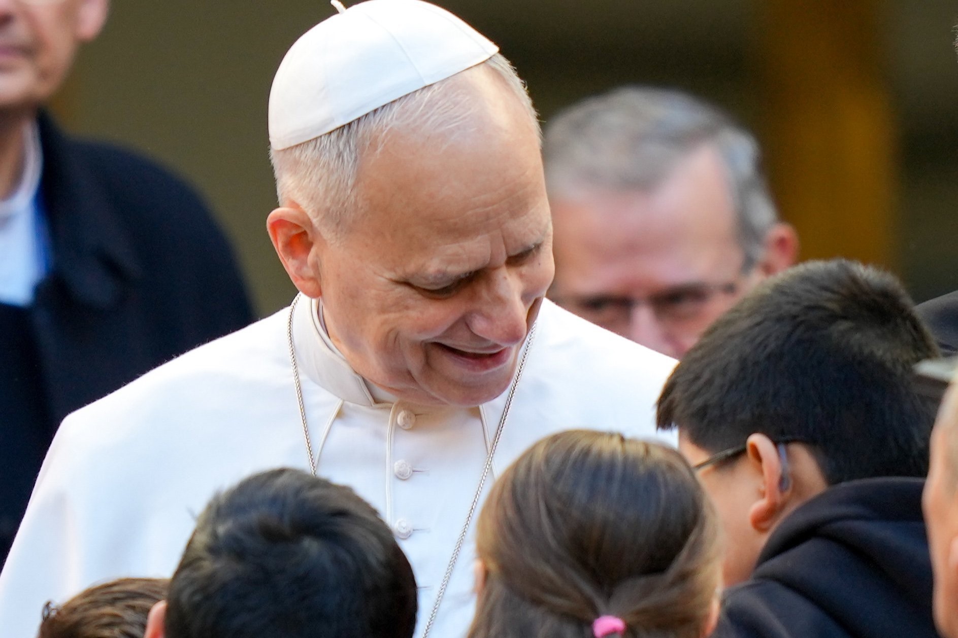 Pope Leo XIV greets children during a pastoral visit to the Basilica of the Sacred Heart of Jesus in central Rome Feb. 22, 2026. (CNS photo/Lola Gomez)