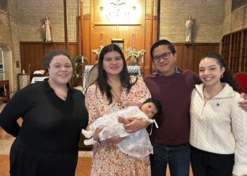 Courtesy photo
Bielka Gonzalez, left, is pictured with Daniela and Chris Lim at the Baptism of their daughter, Felicity, as well as their friend Liby Pelegrin, far right.  With Chris Lim as her sponsor, Gonzalez will enter into full communion with the Catholic Church in April.
