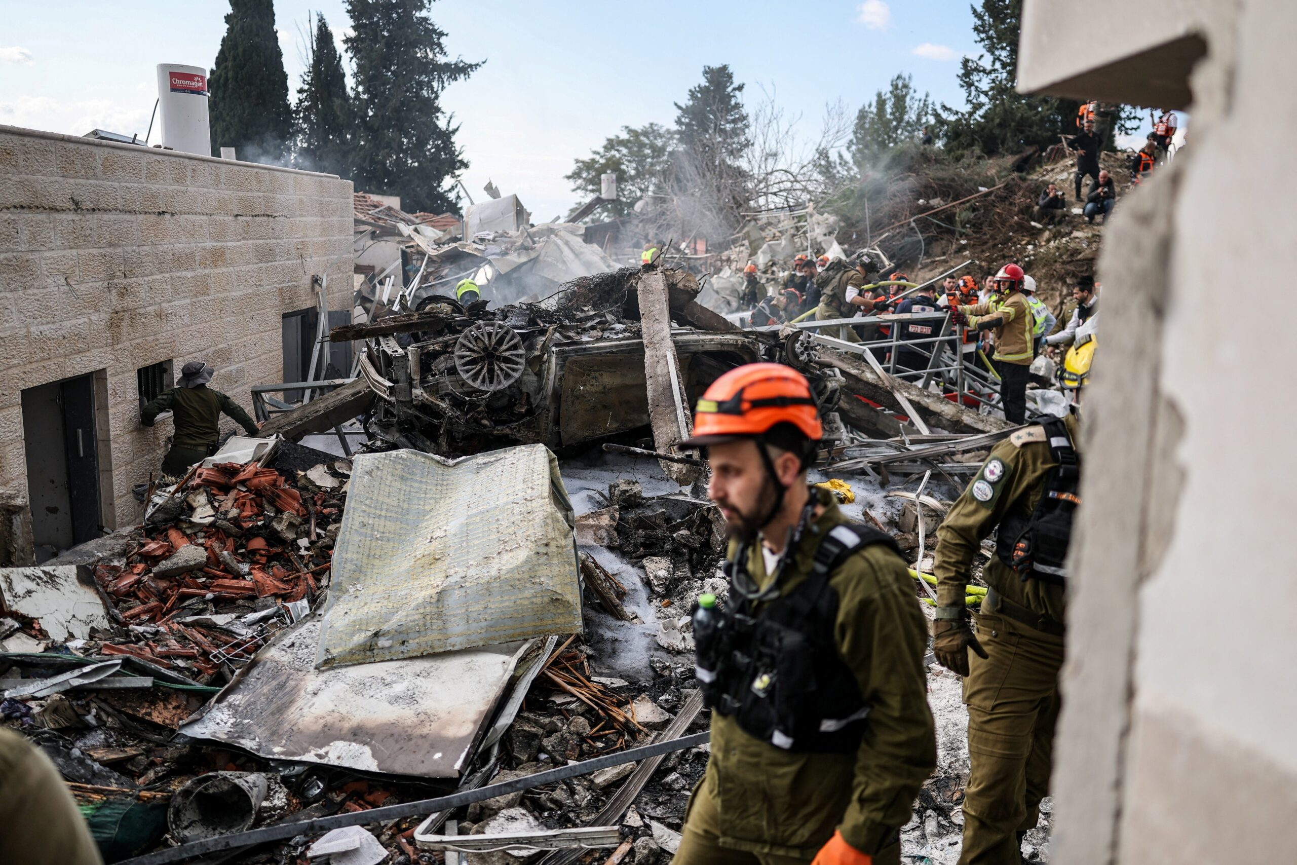 Emergency personnel work at the site of an Iranian strike, after Iran launched missile barrages following attacks by the U.S. and Israel on Feb. 28, 2026, in Beit Shemesh, Israel March 1. (OSV News photo/Ammar Awad, Reuters)