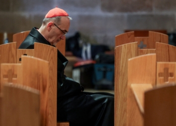 Cardinal Pierbattista Pizzaballa, the Latin Patriarch of Jerusalem, sits in the Church of All Nations March 29, 2026, at a prayer service to mark Palm Sunday, following the cancellation of the traditional Palm Sunday procession from the Mount of Olives, amid restrictions on gathering in large groups and the U.S.-Israeli conflict with Iran, in Jerusalem.
