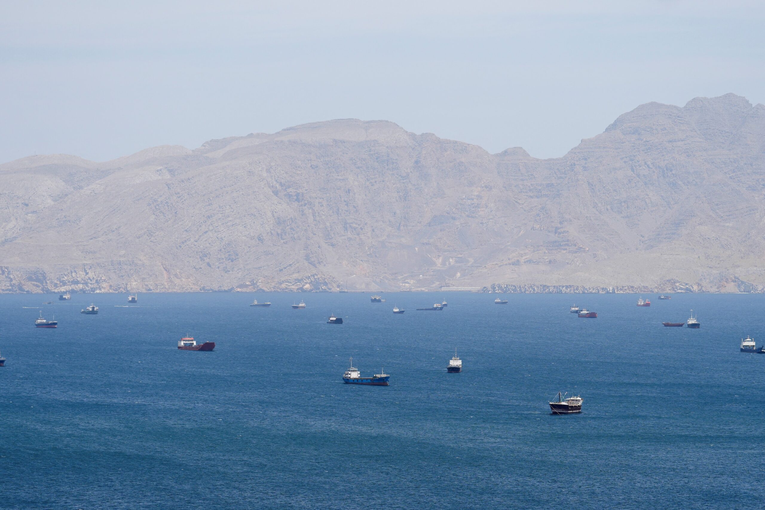 Vessels are seen in the Strait of Hormuz in the Musandam Peninsula April 27, 2026. As the U.S. and Iran face off over the Strait of Hormuz, Catholic maritime ministry leaders are calling for prayer and support for the thousands of souls trapped at sea amid the war. (OSV News photo/Reuters)