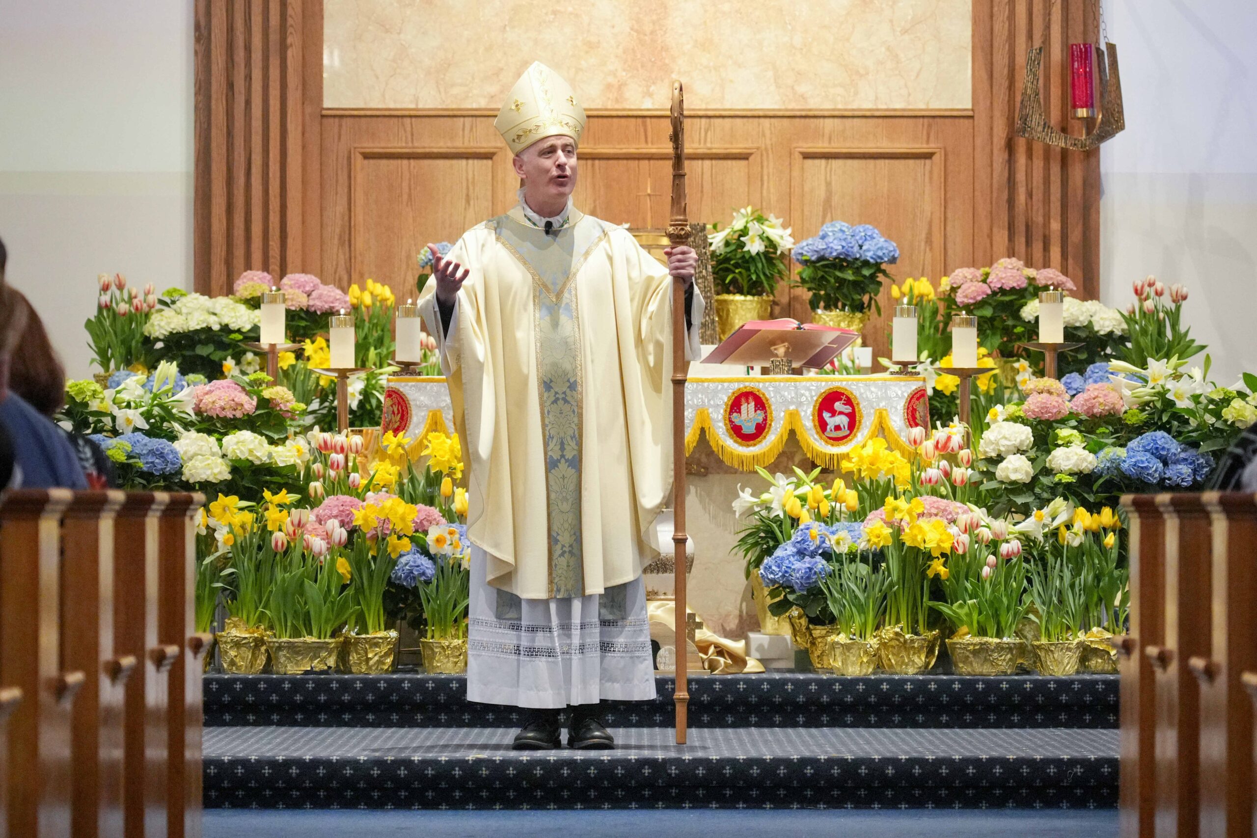 Bishop Joseph Williams celebrates Easter Mass at Our Lady of Peace Parish in Williamstown, Sunday, April 5, 2026.