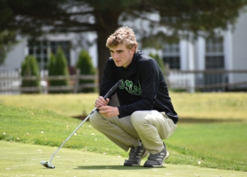 McGettigan eyes up a putt during the championships.