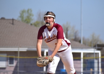 Photos by Mark Zimmaro
Gloucester Catholic junior Madelyn McGinn gets ready to throw a pitch in a game against Schalick on April 10.