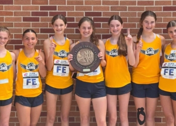 Runners from Saint Joseph Regional School, Somers Point, won the Camden Diocese Girls 4x100.