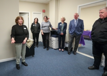 Aimee Brown, regional program coordinator for Catholic Charities of South Jersey who serves Cape May, Atlantic and Cumberland counties, left, speaks at the new Cape May County Family and Community Center in Cape May Court House, Monday, March 30, 2026.