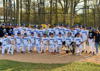 Photo by Mike Walsh
The Paul VI High School varsity baseball team hold their trophy after winning the Ralph Shaw Classic on April 12 in Audubon.