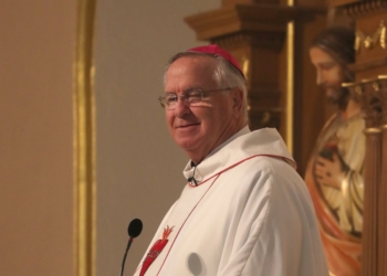 Phoenix Bishop John P. Dolan smiles as he delivers the homily during Mass at St. Mary's Basilica June 27, 2025, during the Catholic Media Conference in Phoenix. (OSV News photo/Bob Roller)