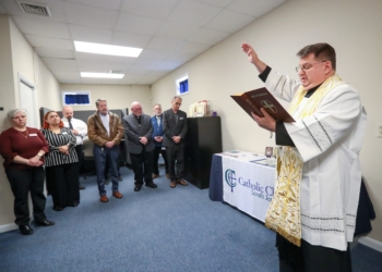 Father Peter Idler, V.F., pastor of All Saints Parish in Millville and dean of Deanery 5 which covers Cape May and Cumberland counties, blesses the new Cape May County Family and Community Center in Cape May Court House, Monday, March 30, 2026.