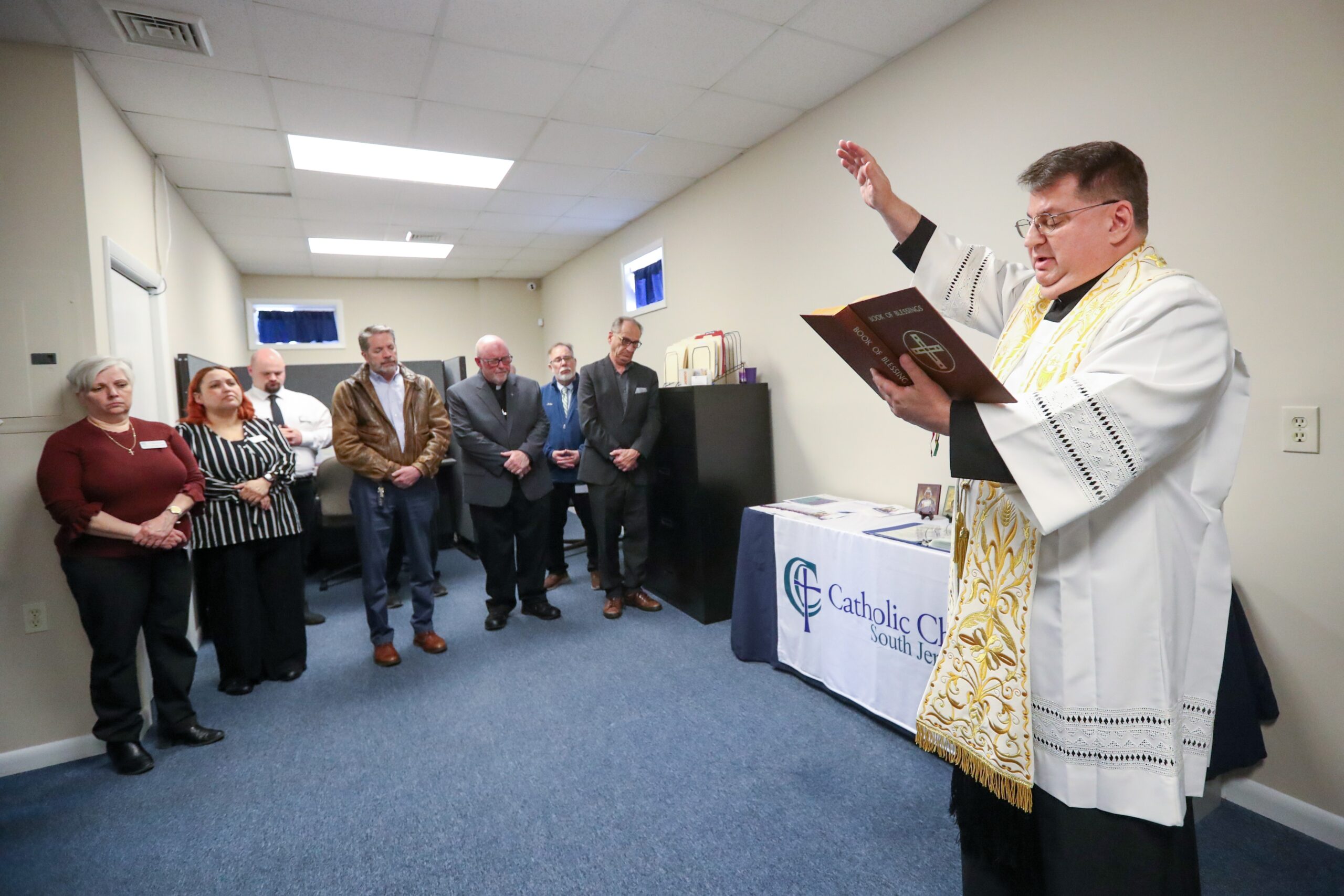 Father Peter Idler, V.F., pastor of All Saints Parish in Millville and dean of Deanery 5 which covers Cape May and Cumberland counties, blesses the new Cape May County Family and Community Center in Cape May Court House, Monday, March 30, 2026.