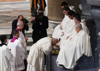 Pope Leo XVI washes the feet of clergymen as he celebrates the Holy Thursday Mass of the Lord’s Supper in the Basilica of St. John Lateran at Vatican April 2, 2026. (OSV News photo/Vincenzo Livieri, Reuters)