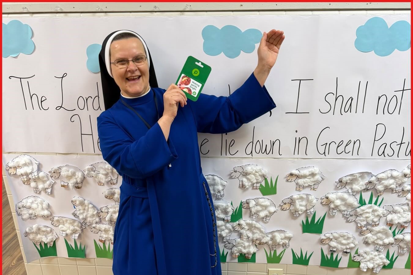Courtesy photos
Sister smiles as she stands in front of a poster that reads, “The Lord is my Shepherd.” Of her vocation, she says, “My days are filled with joy, love, peace and happiness, as well as struggles to give my very best, because gold must be tested in fire.”