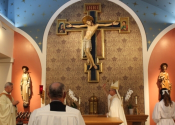 Bishop Barry C. Knestout of Richmond, Va., blesses the sanctuary of the renovated Our Lady of the Rosary in Crozet, Va., April 19, 2026. The Catholic community in Crozet that once gathered for Mass in a private school has now finished the renovation of the former branch bank it bought almost three years ago to become their church. (OSV News photo/Joe Staniunas, Catholic Virginian)