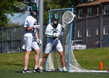 Logan, right, and Camden Catholic freshman defender Adam McManis stand ready during the game at Father Judge.