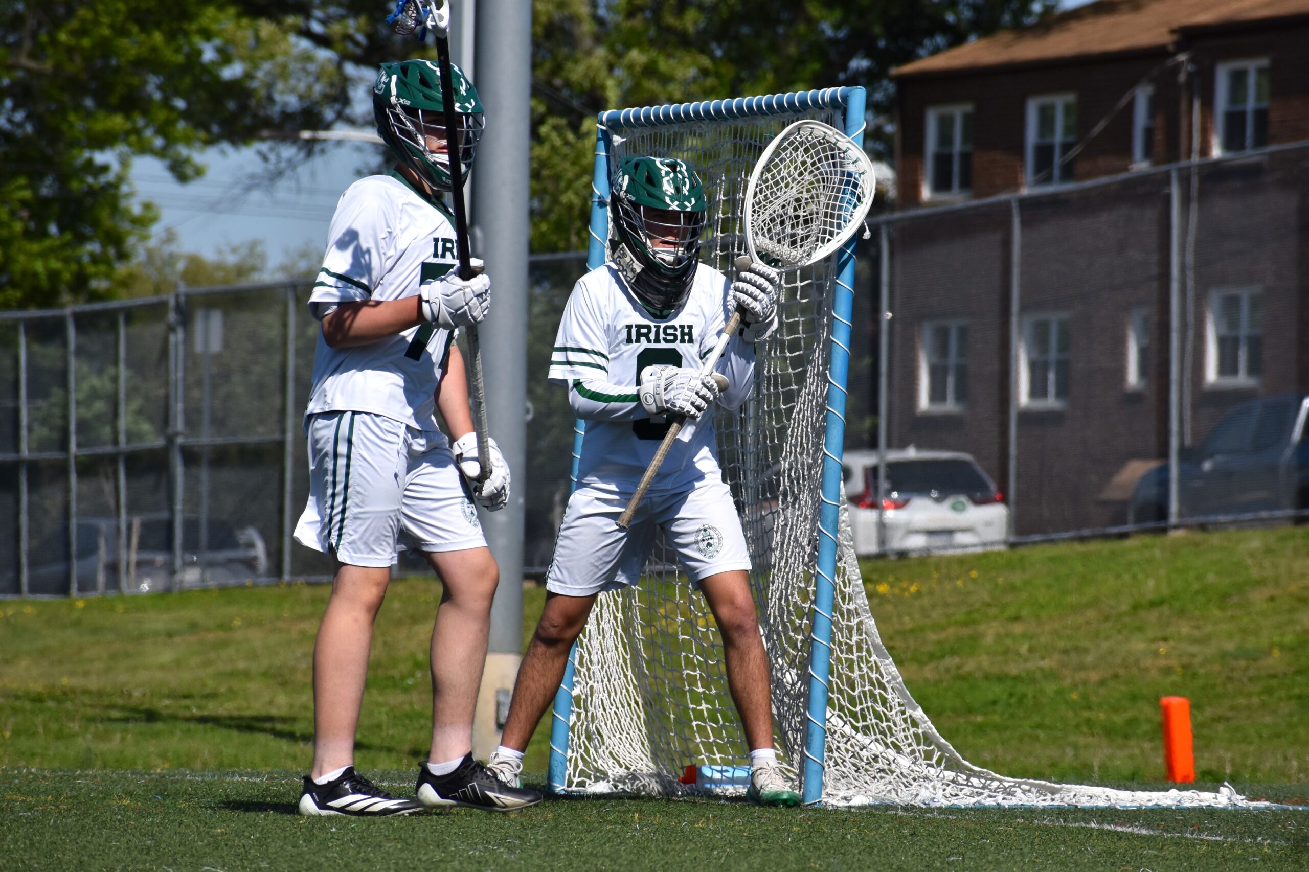 Logan, right, and Camden Catholic freshman defender Adam McManis stand ready during the game at Father Judge.