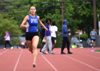 Magee races down the home stretch of the 400-meter run.