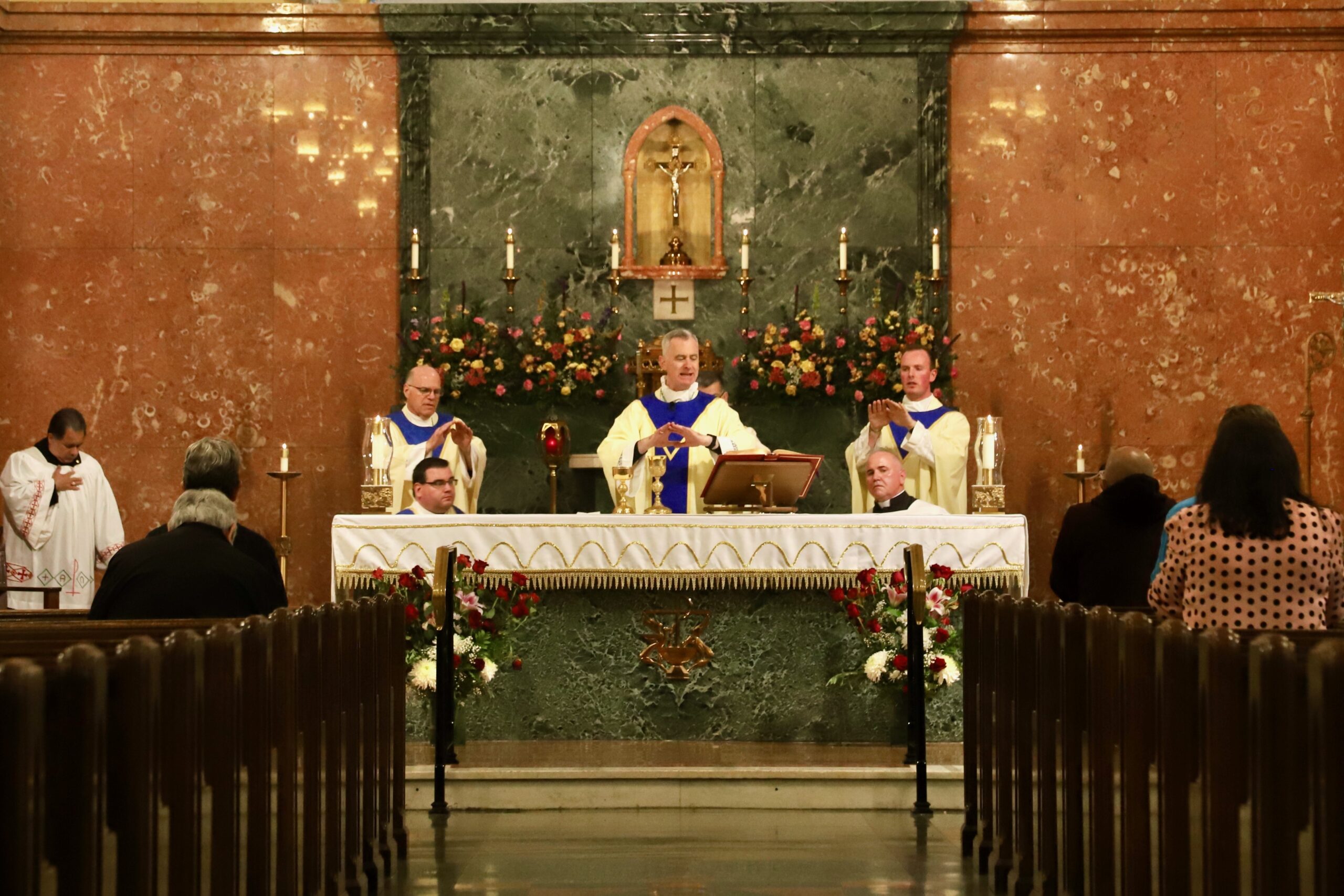 Photos by Mike Walsh
Bishop Joseph Williams celebrates Mass at the Cathedral of the Immaculate Conception, Camden, with Father Nicholas Dudo, vicar for clergy, left, and Father Stephen Robbins, Cathedral administrator, right.