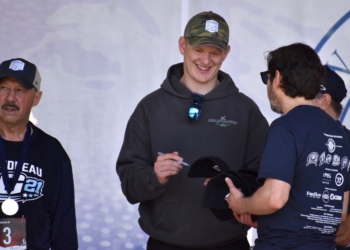 Brady Tkachuk, Ottawa Senators captain and Olympic gold medalist, signs autographs May 16 during the 2nd Annual Gaudreau 5K & Family Fun Day at Washington Lake Park. (Photos by Mark Zimmaro)