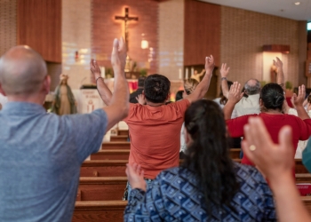 Photos by Frank Scaramuzzo
Dozens of South Jersey’s faithful lift their arms in praise during the Hispanic Catholic Charismatic Renewal on May 16 in Bellmawr.
