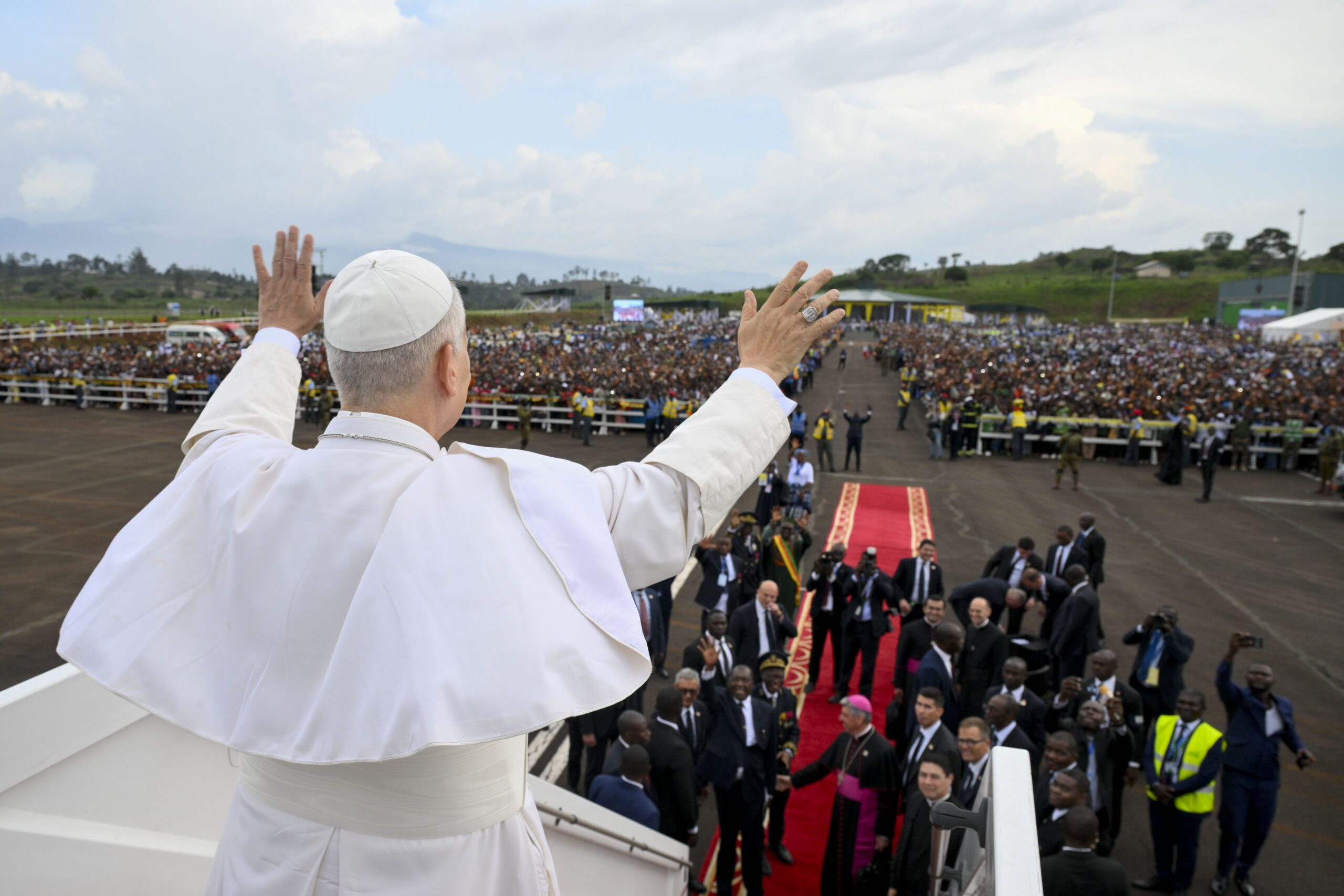 Pope Leo XIV gestures to the crowd as he boards the papal plane at Bamenda International Airport in Cameroon April 16, 2026, en route to in Yaoundé, Cameroon. Pope Leo XIV’s first encyclical, "Magnifica Humanitas," will be published May 25, addressing artificial intelligence and the protection of human dignity, the Vatican announced May 18, 2026. (OSV News photo/Simone Risoluti, Vatican Media)