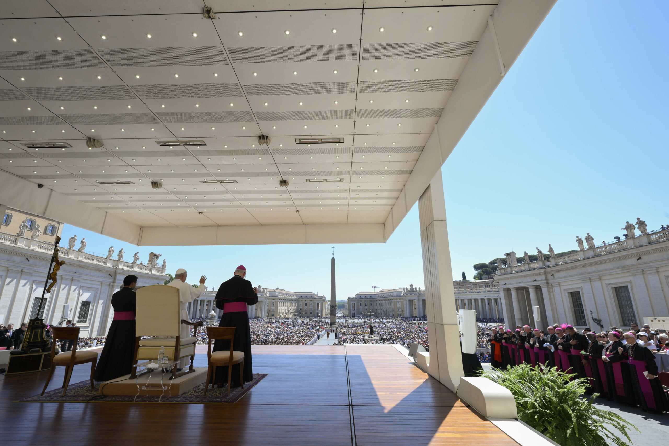Pope Leo XIV greets visitors and pilgrims from the popemobile while riding around St. Peter’s Square at the Vatican before his weekly general audience May 27, 2026. (CNS photo/Courtesy of Vatican Media)