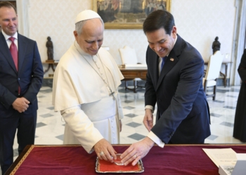 Pope Leo XIV exchanges gifts with U.S. Secretary of State Marco Rubio during a private audience at the Vatican May 7, 2026. (OSV News photo/Matteo Pernaselci, Vatican Media)