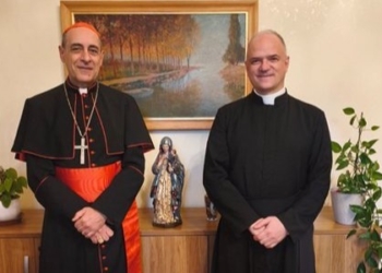 Cardinal Víctor Manuel Fernández, prefect of the Dicastery for the Doctrine of the Faith, and Father Davide Pagliarani, superior general of the traditionalist Society of St. Pius X, are pictured at the Vatican Feb. 12, 2026. The cardinal met with Father Pagliarani after the traditionalist group announced plans to consecrate bishops without papal approval, raising fears of a renewed schism. (OSV News photo/courtesy Dicastery for the Doctrine of the Faith) Editors: best quality available.