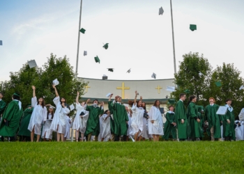 Photo by Joe Warner
Members of the Class of 2026 toss their mortarboards into the air at the end of the graduation ceremony June 5 outside Camden Catholic High School, Cherry Hill.