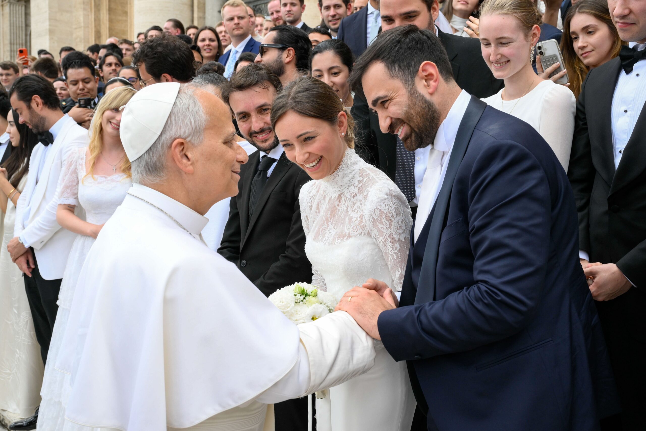 Pope Leo XIV greets newlyweds after his weekly general audience in St. Peter’s Square at the Vatican June 3, 2026. (CNS photo/Vatican Media)