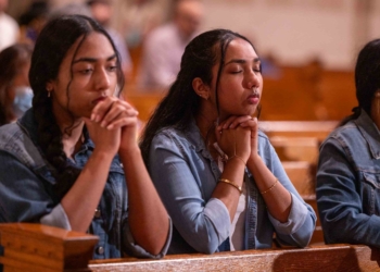 Two young women participate in a worldwide rosary for peace May 30, 2026, at the Basilica of the National Shrine of the Immaculate Conception in Washington. Pope Leo XIV presided over the rosary from the Lourdes grotto in the Vatican Gardens, uniting Marian shrines around the world in that effort on that day. (OSV News photo/Mihoko Owada, Catholic Standard)