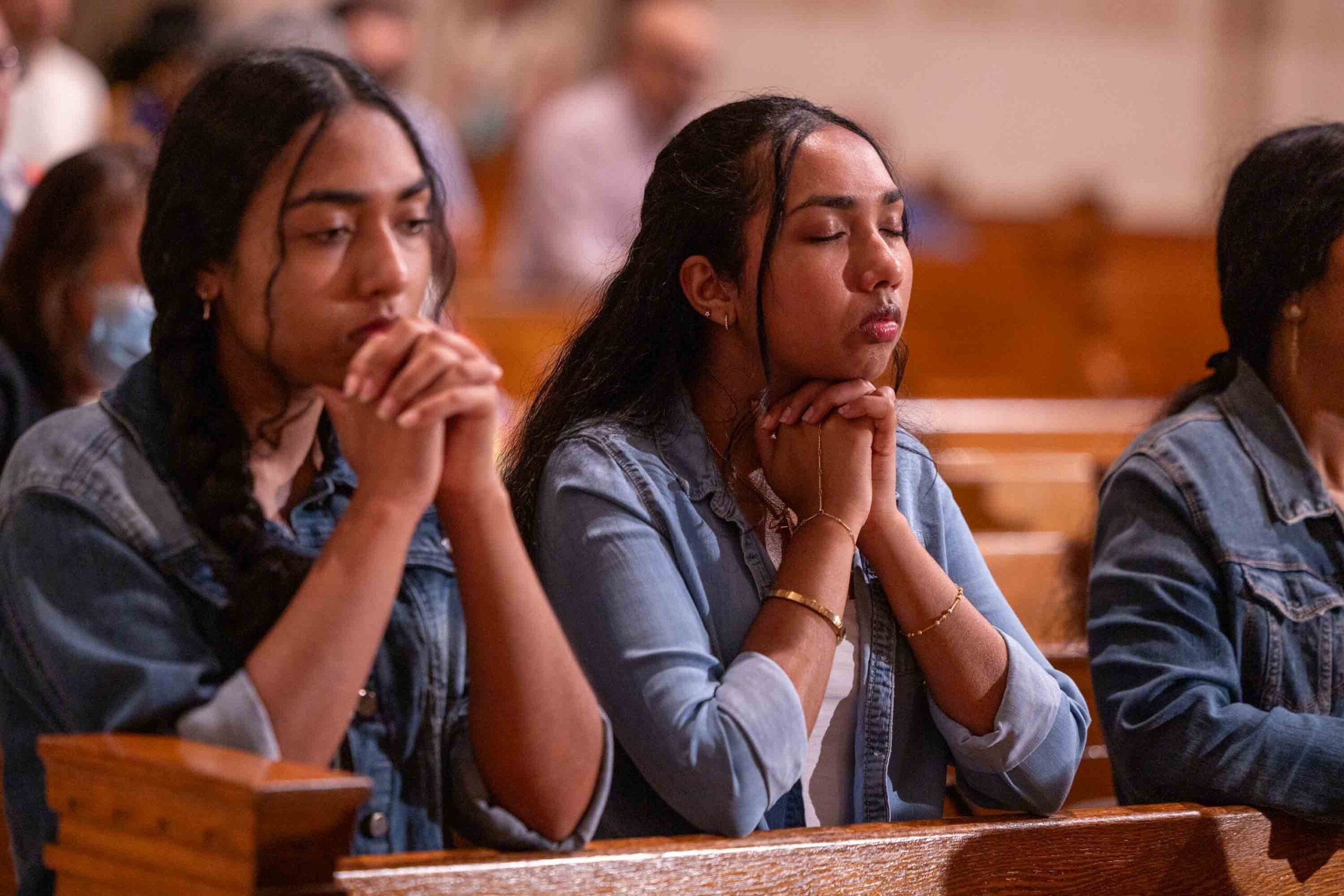 Two young women participate in a worldwide rosary for peace May 30, 2026, at the Basilica of the National Shrine of the Immaculate Conception in Washington. Pope Leo XIV presided over the rosary from the Lourdes grotto in the Vatican Gardens, uniting Marian shrines around the world in that effort on that day. (OSV News photo/Mihoko Owada, Catholic Standard)