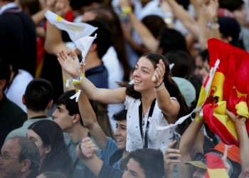 Young girl reacts to a music performance on stage as youth gather ahead of a prayer vigil held by Pope Leo XIV at Plaza de Lima during his apostolic journey in Madrid, June 6, 2026. (OSV News/Mohammad Salem, Reuters)